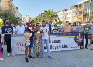 MİLLİ ATLET ŞAHİN ŞENODUNCU’YA ÇİÇEKLİ KARŞILAMA
